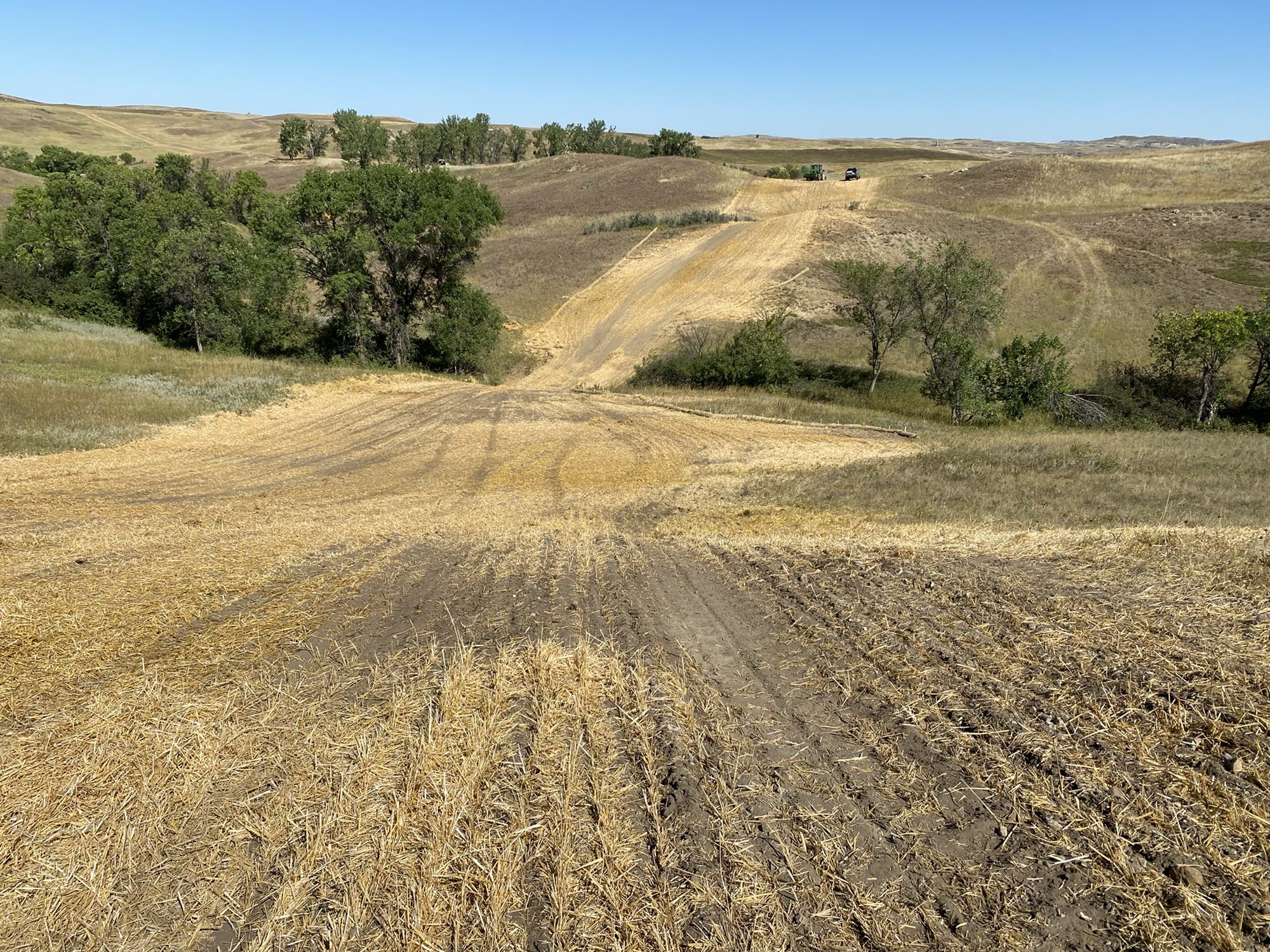 Straw cover on a restored hillside corridor